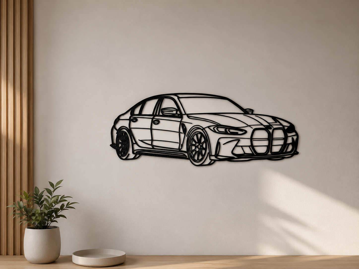 Black 3D printed BMW M3 car silhouette mounted on an interior wall